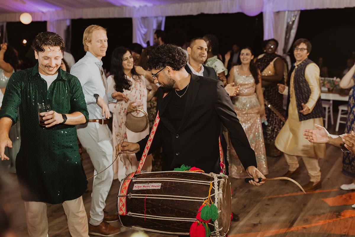 Guests celebrating on packed dance floor