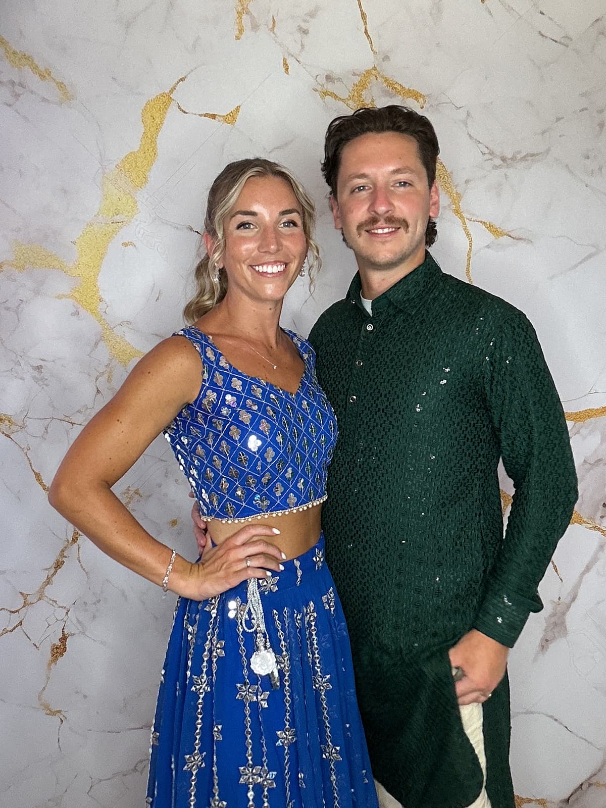 Fun group photo booth moment at reception